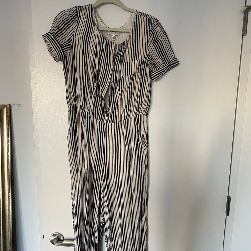 Dark navy striped jumpsuit from Anthropologie
